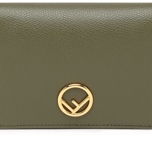 F is Fendi compact bi-fold wallet. Interior organised with a flat pocket, a coin pocket with press stud and four card slots. Made of red tumbled Cruise leather. Decorated with the F is Fendi logo. Gold-finish metalware. Made in Italy