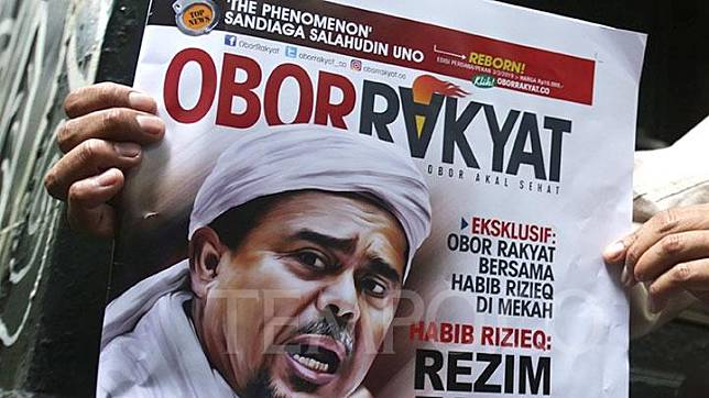 Wajah Rizieq Shihab terlihat pada dummy halaman depan Tabloid Obor Rakyat Reborn di Jakarta, Selasa, 19 Maret 2019. Peluncuran tabloid ini dibatalkan karena dianggap berisi berita yang menuai pro dan kontra. TEMPO/M Taufan Rengganis