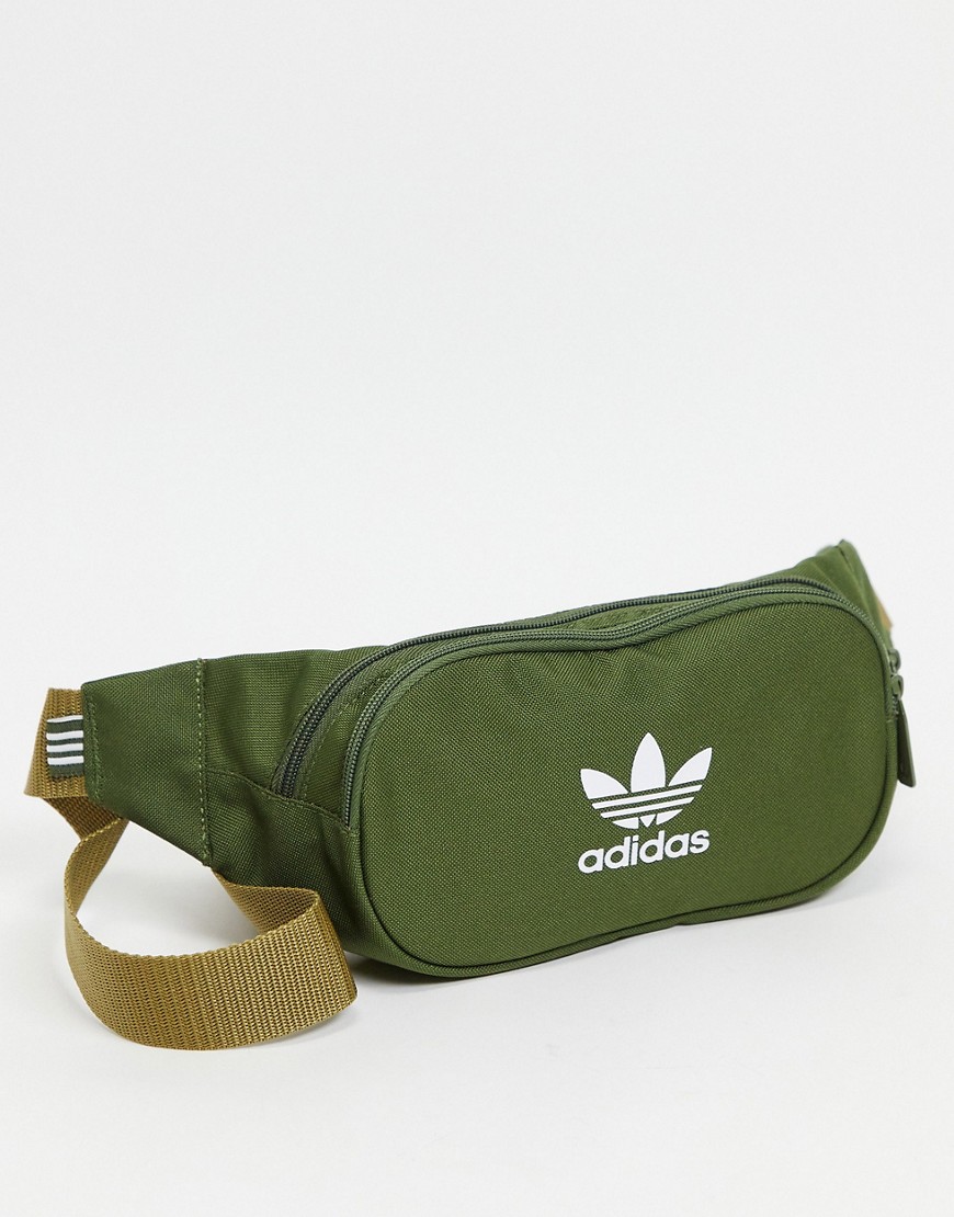 Bag by adidas Part of our responsible edit Adjustable body strap Zip-top fastening External zip pock