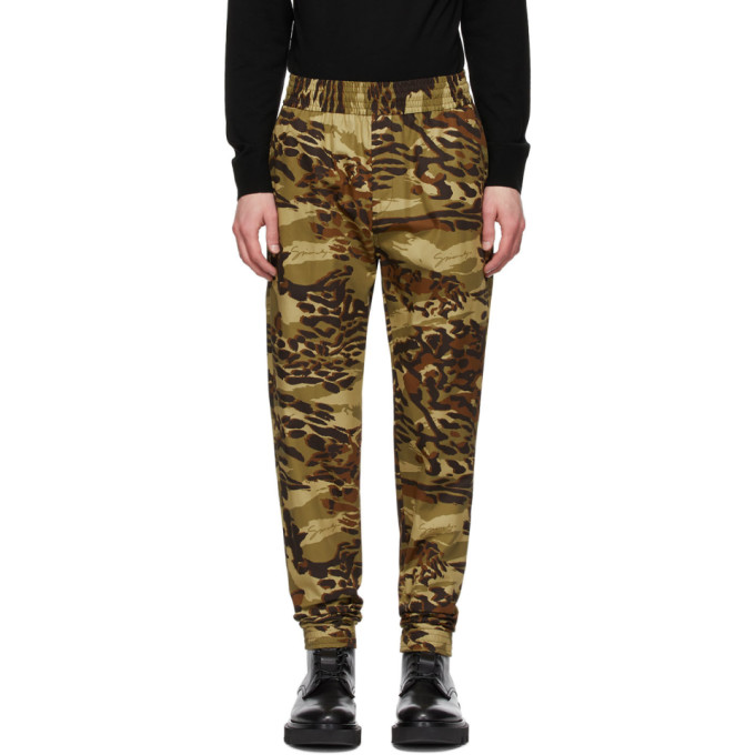 Tapered cotton twill lounge pants featuring printed camouflage pattern in tones of brown and green t