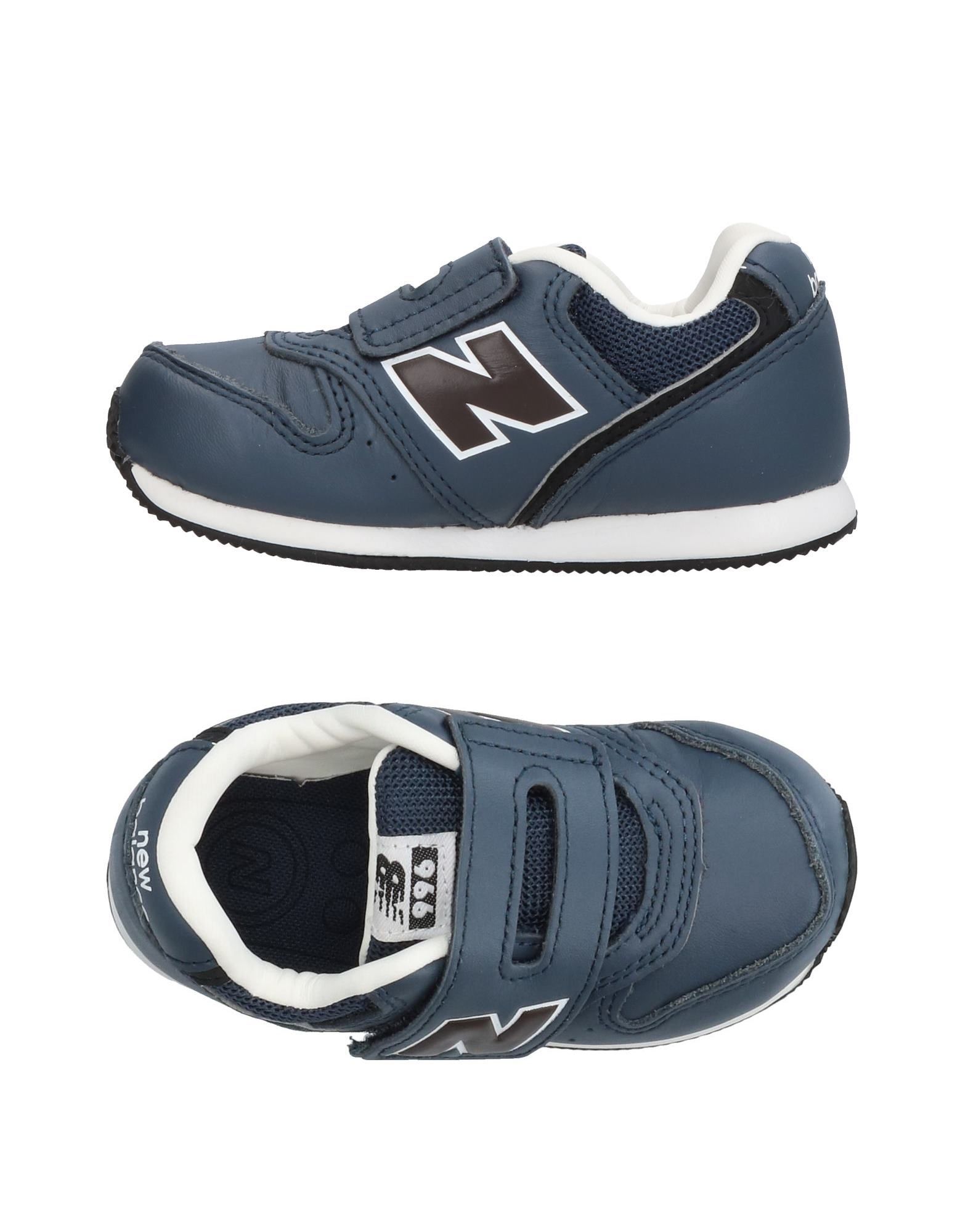 techno fabric, logo, solid color, velcro closure, round toeline, flat, lined interior, rubber cleate