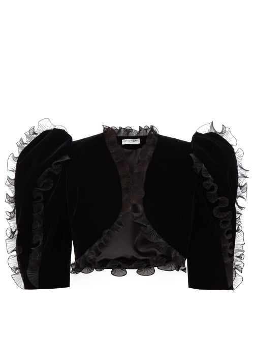 Givenchy - The plissé organza ruffles adorning Givenchy's black bolero jacket were a key element of 