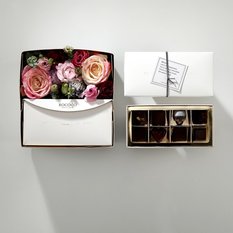 與其傳統的巧克力，不如送盒抒情搖滾吧！還有什麼比鮮花+巧克力更適合送給情人呢？chocolat R 職人與極簡派花藝職人共同出品的玫瑰禮盒，包含8個職人手工巧克力，包含骷髏以及玫瑰之心，鮮花自然風乾後
