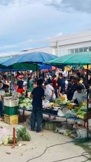 กลุ่มขายของทุ่งกราด