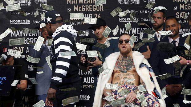 Duel Fantasi: Mayweather Raup Rp5,2 T, McGregor Rp1,6 T