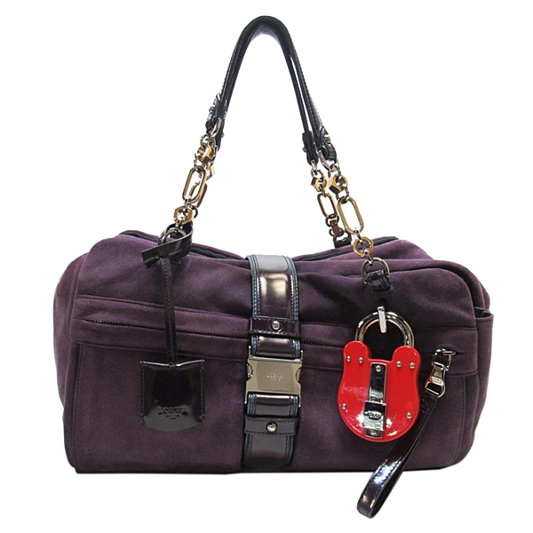 八成新 包包本身有些重量 底部有多道白色刮痕 邊角稍微磨損 金屬髮絲紋