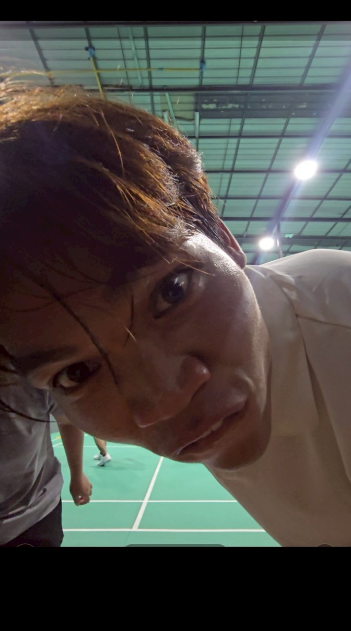 🏸