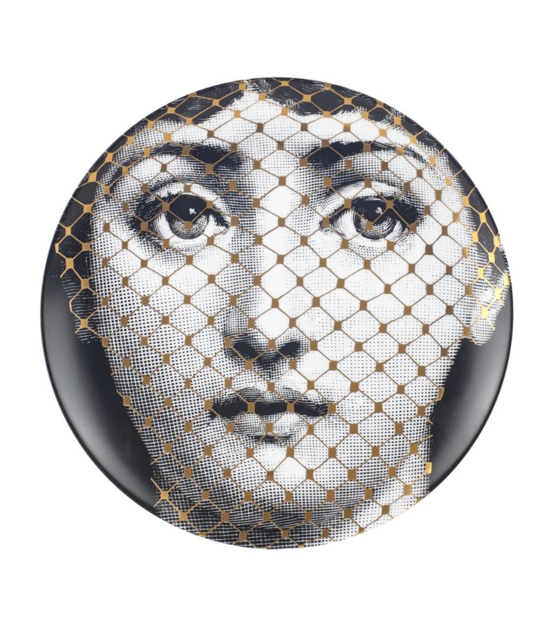 An enduring muse for Piero Fornasetti's art, opera singer Lina Cavalieri's classic yet captivating b
