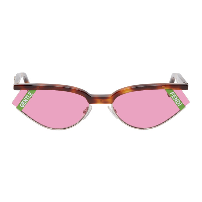 猫眼太阳镜，采用银色金属和玳瑁色醋酸纤维板材。100% 紫外线防护粉色镜片饰有绿色和白色不对称徽标牌。透明橡胶鼻托，镜脚缀有徽标五金。银色五金。尺寸：61.18 145。配有徽标印花编织束带开合的皮革