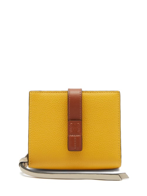 Loewe - Loewe has been handcrafting premium leather goods since 1846 and this yellow wallet is a fin