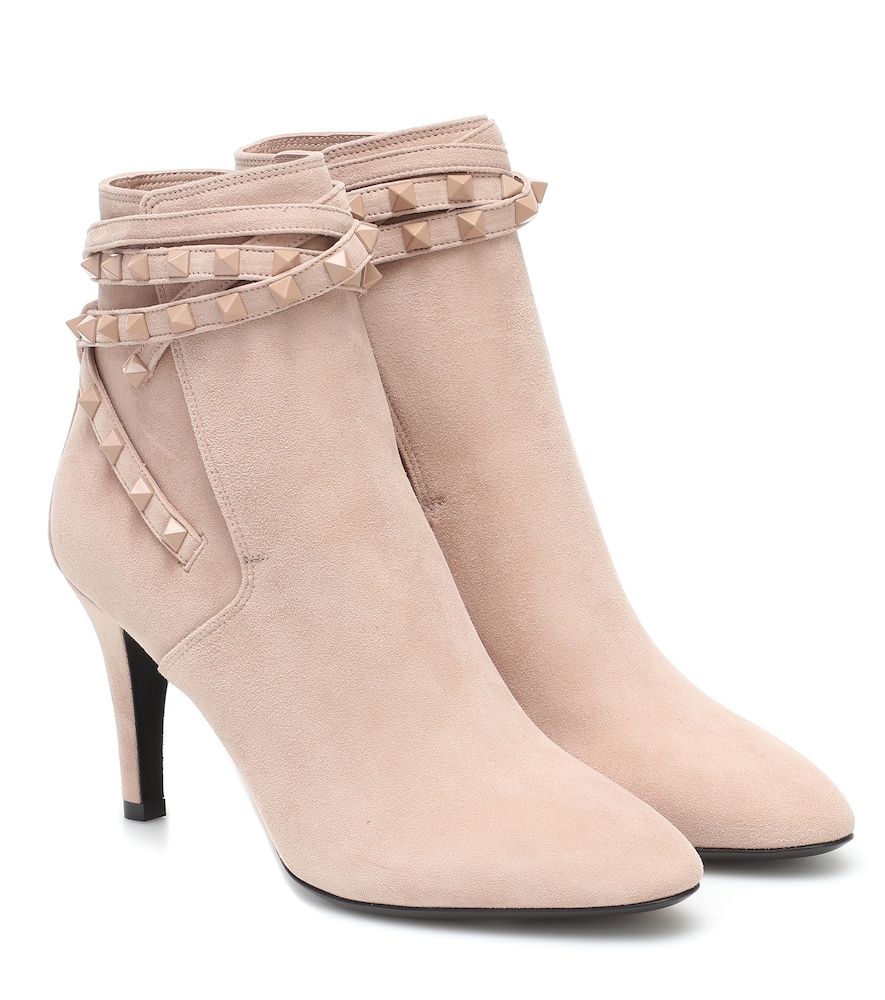 Valentino Garavani's Flair suede boots have been made from plush powder pink suede, and adorned with