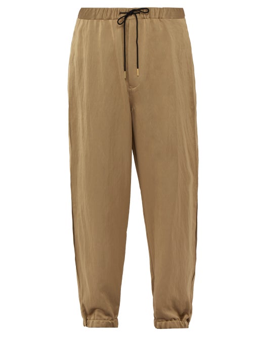 Sasquatchfabrix - These brown Ventilation trousers from cult Japanese brand Sasquatchfabrix highligh