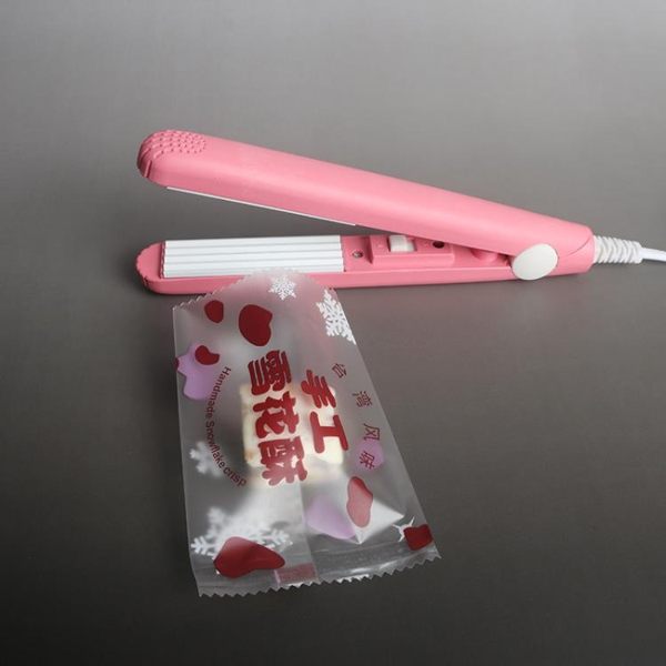 牛軋糖封口機手壓式小型家用迷你便攜零食雪花酥包裝袋糖紙封口機 琉璃美衣
