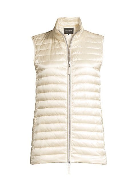 Made of satin tech fabric, this quilted vest is as stylish as it is cozy. Wear alone or as a layerin