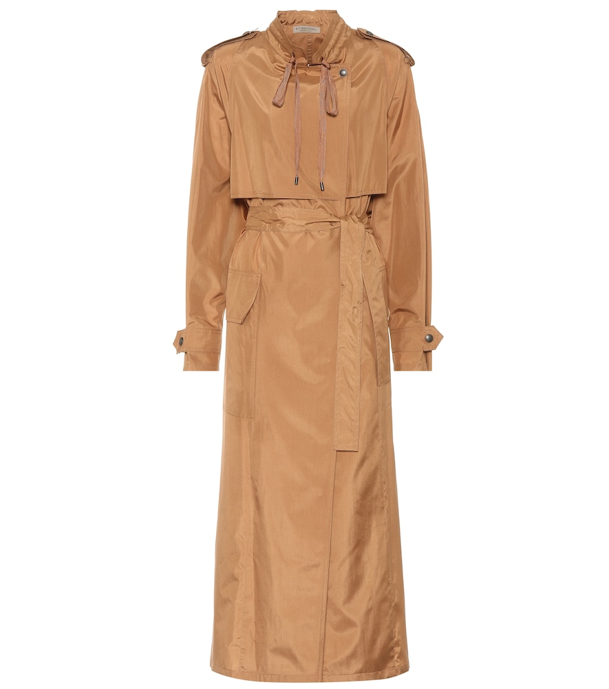 Oversized coats are having a moment and this Bottega Veneta trench coat taps the trend while maintai