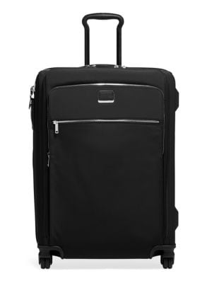 From the Larkin Collection. Spacious and versatile, this four-wheel, expandable case comes with a re