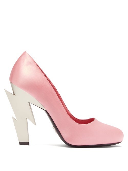 Prada - Prada's pink pumps rest on a statement lightning bolt-shaped silver heel, in keeping with th