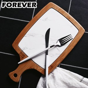 以美食滿足味蕾 以美器妝點生活精緻 陶木結合、剛柔之美盡顯無疑 大理石紋、簡約不失素雅