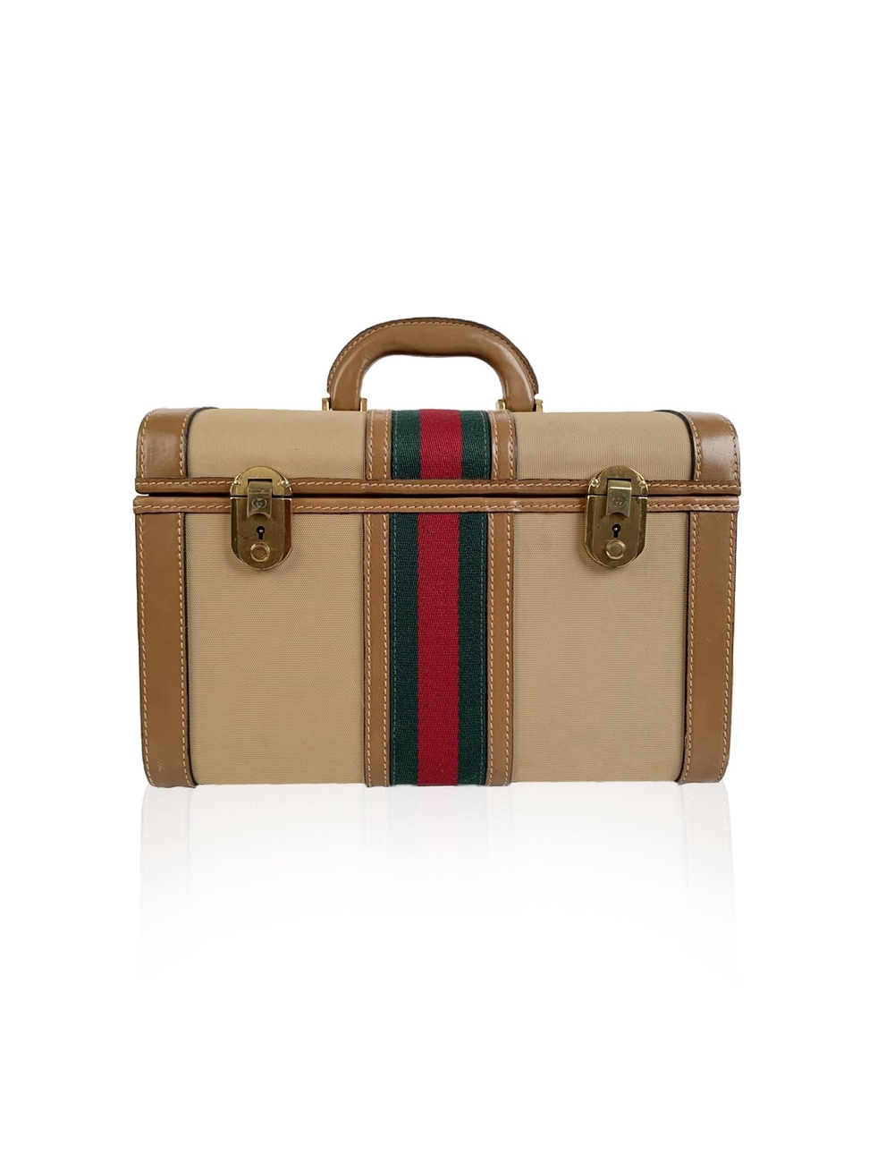 Splendid vintage train case by GUCCI, from the early 1970s. Crafted in beige canvas with tan genuine