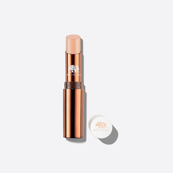 輕盈水亮質地。添加護唇精油淡化唇紋。淡淡的潤色，如同雙唇的素顏霜，更加自然健康。旋轉唇膏到適合塗抹的長度，適量擦於唇部。 | 心花綻放精油潤色護唇膏