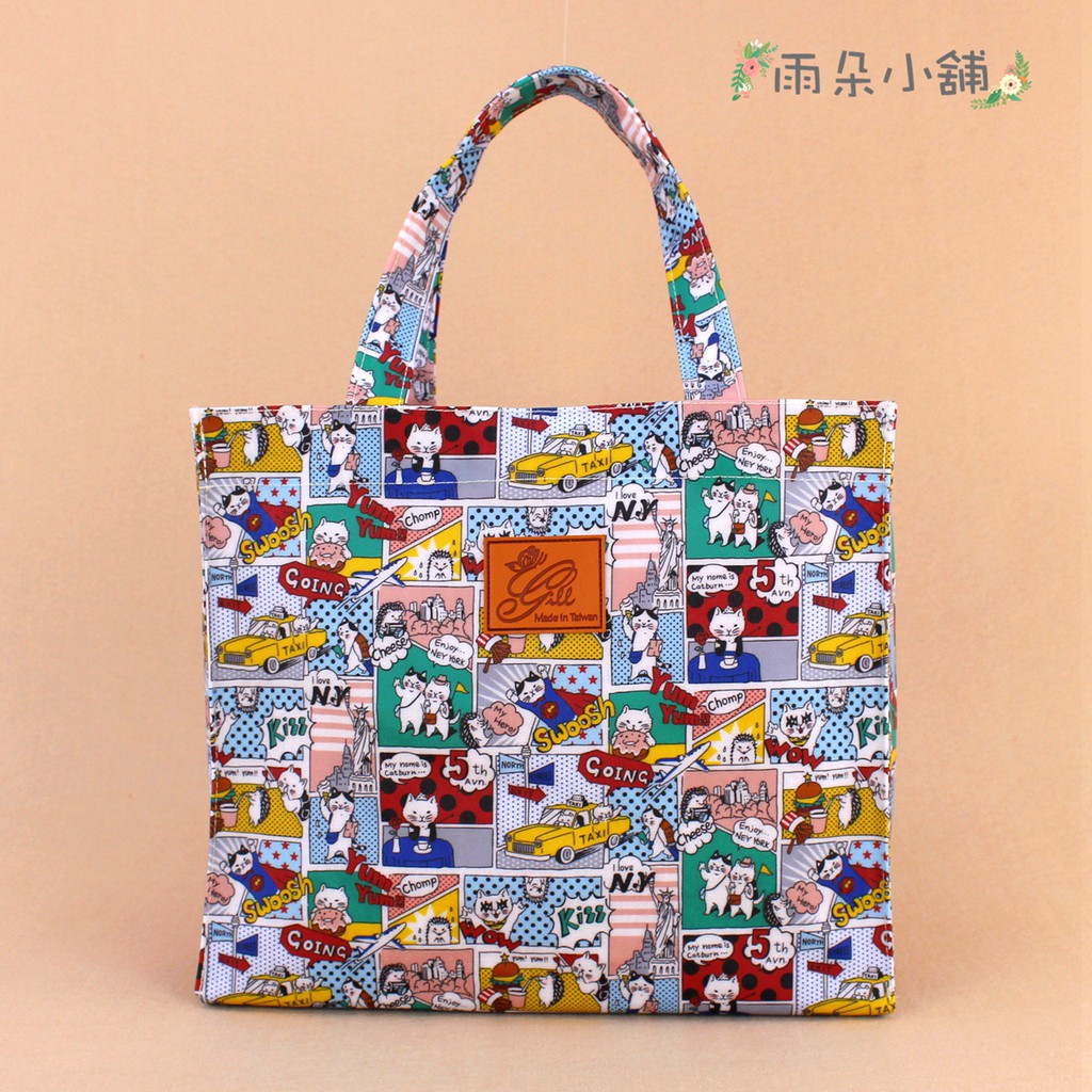 手提包 包包 防水包 M029/654 磁扣袋/白貓咪的漫畫旅遊行02689 funbaobao