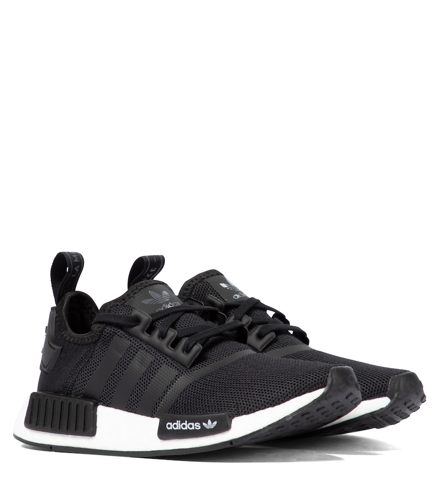 Set your budding trainer collector off on the right foot with these black NMD R1 sneakers from adida