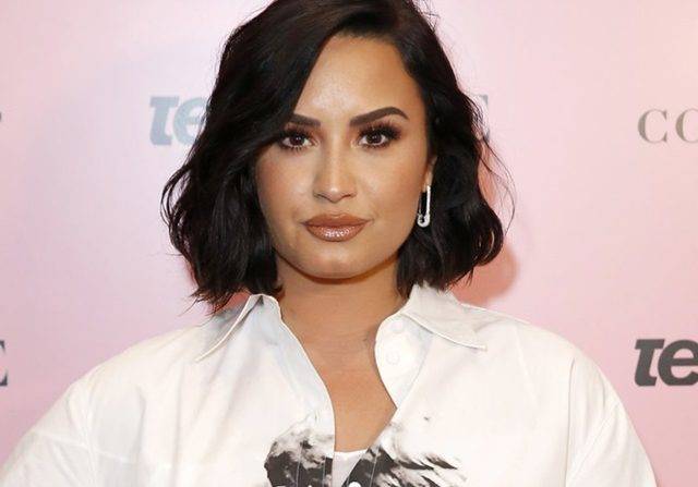 Dalamnya Makna Tato Malaikat  di Punggung Demi Lovato