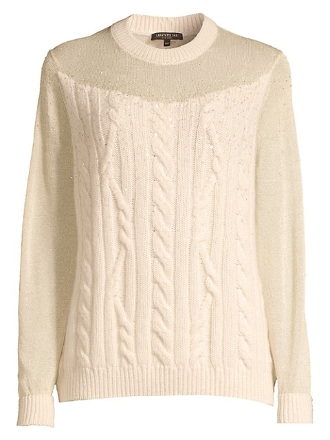 This soft and cozy pullover features a detailed cable-knit design on the front bodice and is made fr