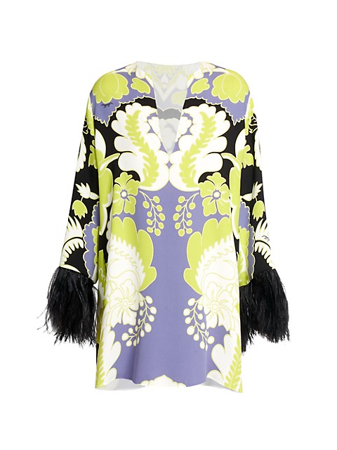A large-scale tapestry motif adorns this mini dress, adding a bohemian touch to a mod silhouette. It