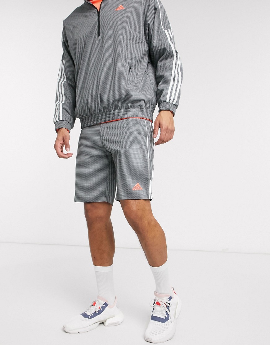 Shorts by adidas A fresh addition Concealed fly Belt loops Side pockets 3-Stripes to side Regular fi