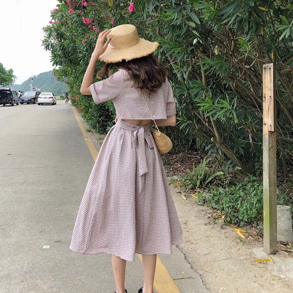 [現貨免運]短袖洋裝 連衣裙 學院風夏季顯瘦個性時尚 氣質休閒韓版格子露背紐扣系帶收腰中長款裙