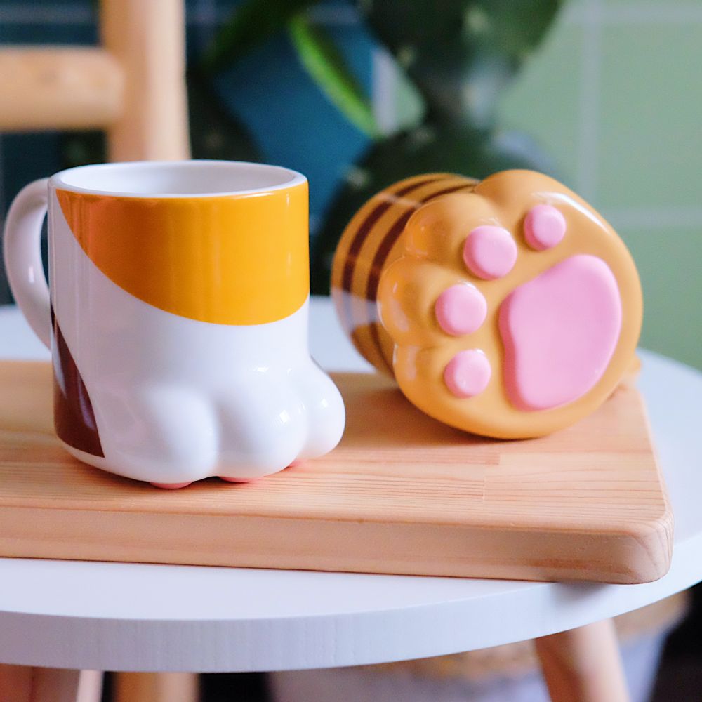 日本創意禮品貓腳腳造型陶瓷馬克杯底部還有做出立體的粉紅色肉球超ｑ的～～～～250ml的容量，剛剛好可以泡杯熱茶！