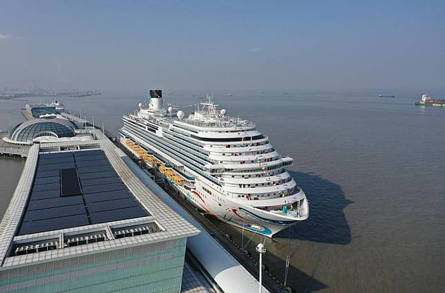 This aerial photo taken on Jan. 1, 2024 shows the large cruise ship Adora Magic City at the Shanghai Wusongkou International Cruise Terminal in east China's Shanghai. (Xinhua/Ding Ting)