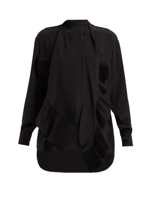 Givenchy - Givenchy's black blouse epitomises the French house's ability to balance both classic and