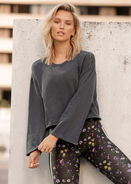 Designer Notes: This cropped long sleeve is the latest athleisure must have! With its raw edge detai