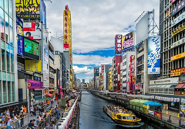 大阪的道頓堀川及沿街的商店是廣受許多國際遊客歡迎的景點。（示意圖／翻攝Unsplash）