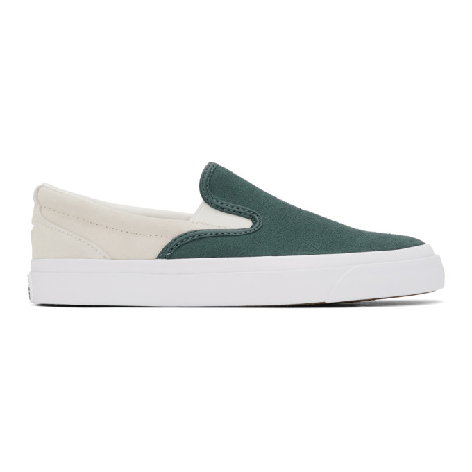 Low-top slip-on suede sneakers colorblocked in red and off-white. Round toe. Elasticized gussets at 