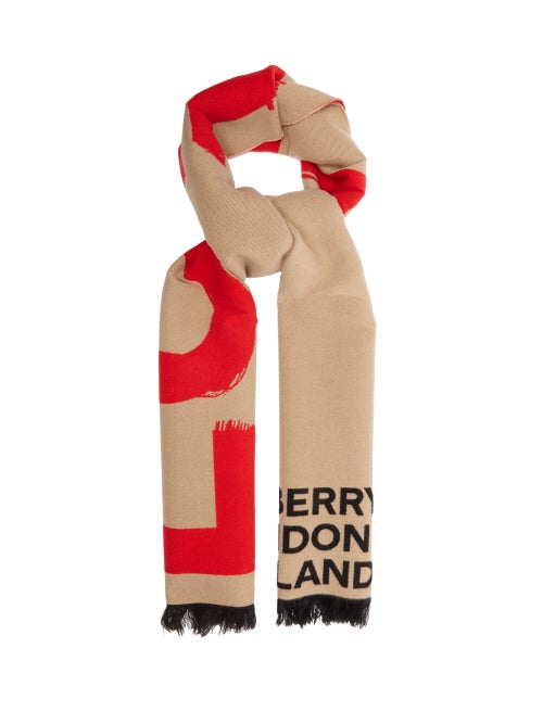 Burberry - Burberry draws inspiration from traditional sportswear codes with this beige scarf. It's