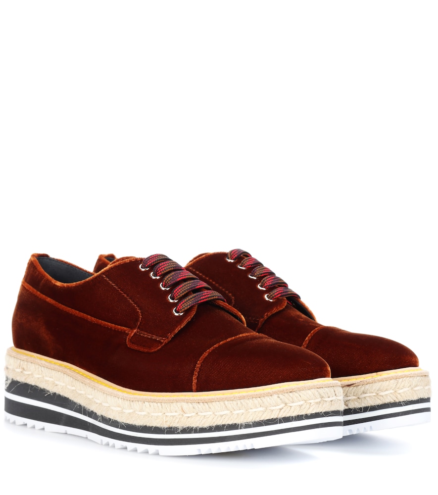 Prada showcases its take on '90s girl power with these height-adding platforms.