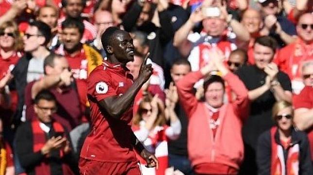 Striker Liverpool Sadio Mane merayakan golnya ke gawang Wolverhampton Wanderers di Anfield pada pekan terakhir Liga Inggris. Paul ELLIS / AFP