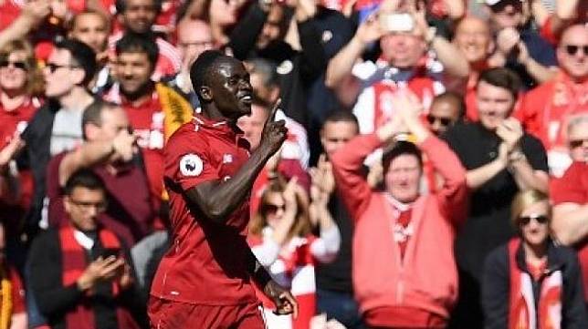 Striker Liverpool Sadio Mane merayakan golnya ke gawang Wolverhampton Wanderers di Anfield pada pekan terakhir Liga Inggris. Paul ELLIS / AFP