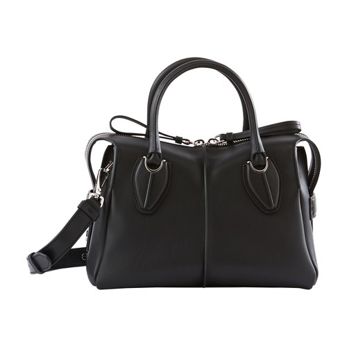 The straight lines and designer cuts of the iconic D-Styling Bauletto handbag from Tod's permeate th