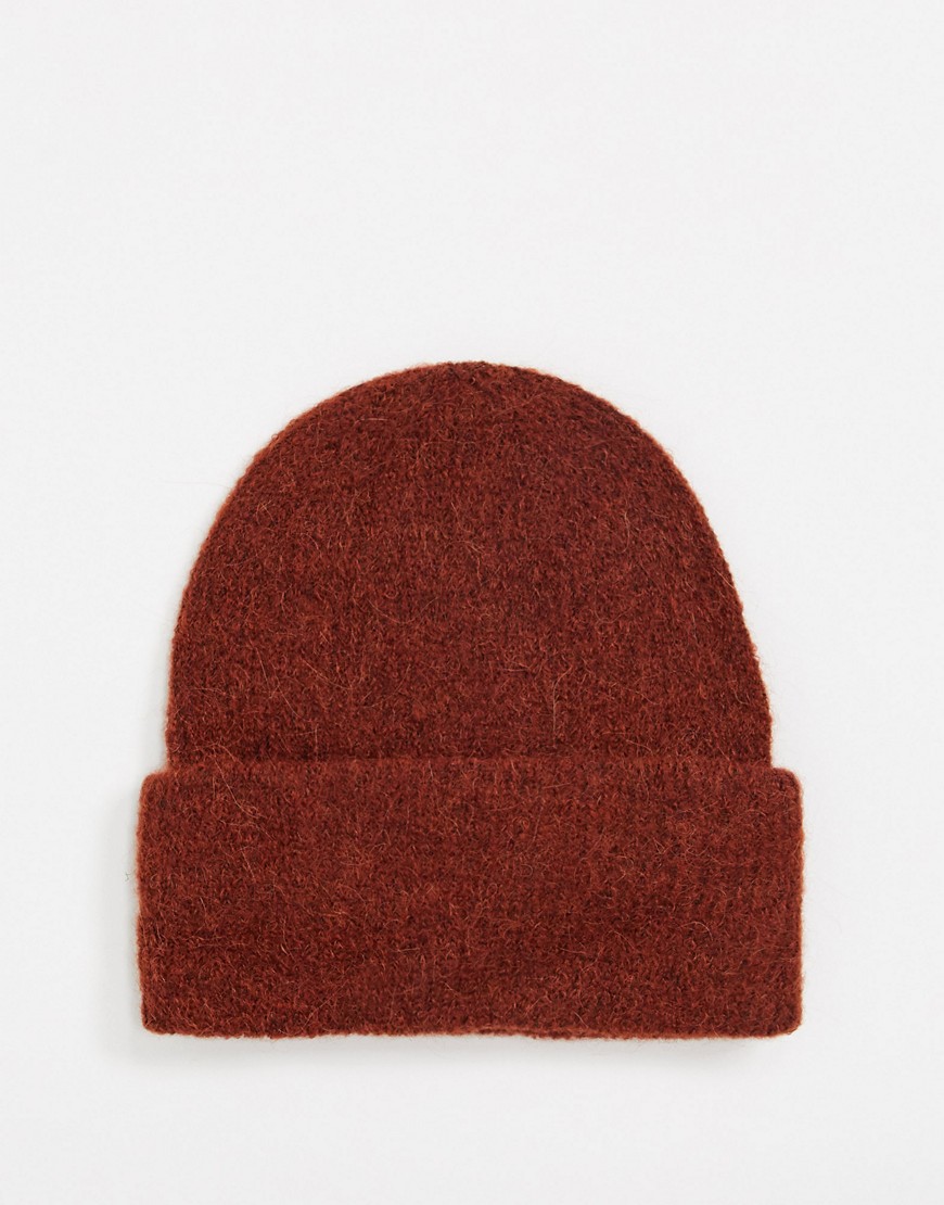 Hat by PIECES Cosy never looked so good Plain design Domed crown Turn-up brim
