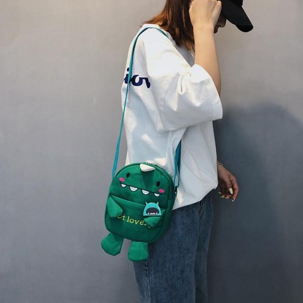 斜背包可愛小包包丑萌搞怪少女心帆布袋學生韓版斜背百搭卡通側背包 寶貝計書