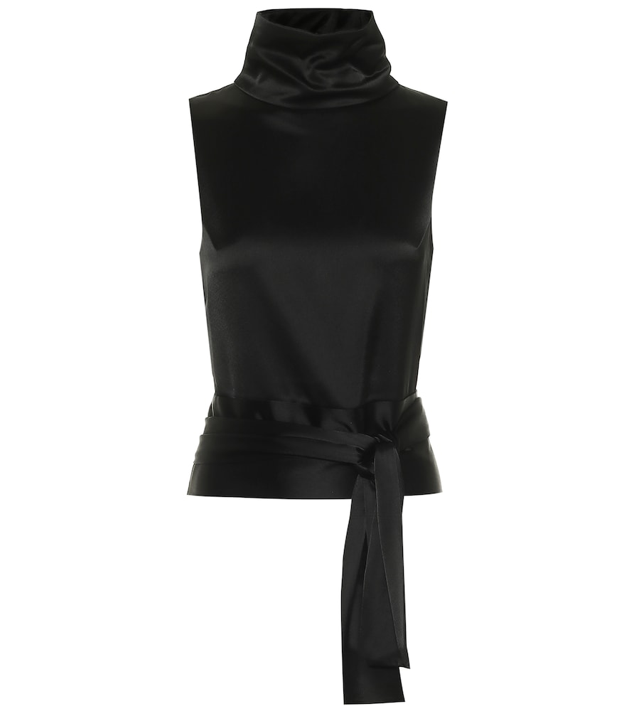 Galvan revolutionizes evening attire with the sophisticated Luna blouse.