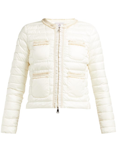 Moncler - Moncler's ivory Wellington jacket is infused with feminine flourishes. The boxy silhouette