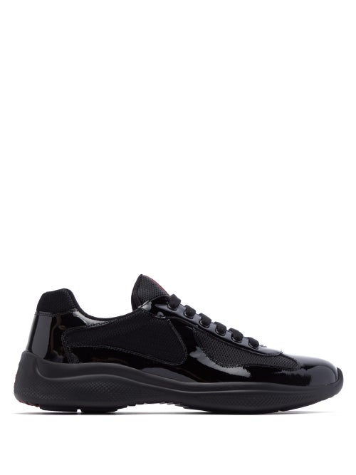 Prada - Prada's sleek black low-top trainers were first designed for the Luna Rossa team in the worl