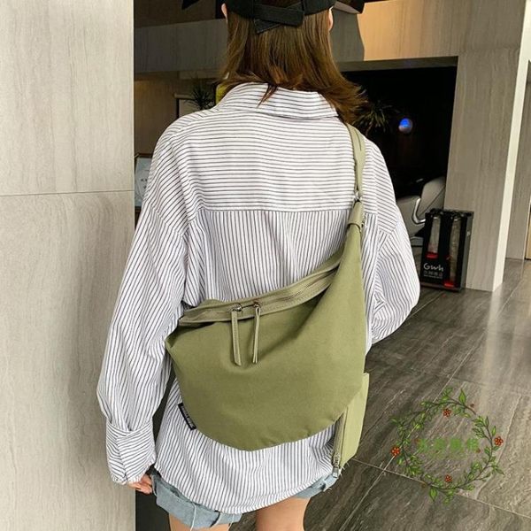 一件8折免運 上新港風帆布包包女包 新款 潮ins日韓學生文藝單肩包餃子包