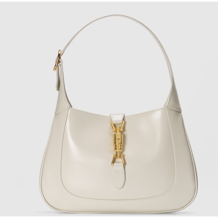 #全新#正品#Gucci#Jackie 1961#系列#小号#手袋 #手提包 #肩背包#現貨白色商品型號：‎636709 10O0G 1000尺寸： 27.5x19x4cm 商品細節：636709 10O0G 9022白色皮革金色調配件麂皮質感超細纖維襯裏內部：1個開口口袋，1個拉鍊口袋這款手袋附贈額外的肩帶，可通過搭扣固定在手袋上提手：肩帶高18釐米（到中央孔）；提手和額外的肩帶：52釐米高（到中央孔）金屬鎖釦