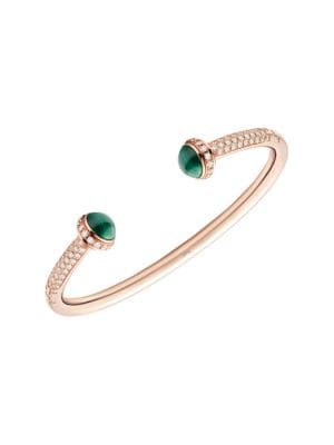 From the Possession Collection. Polished rose gold open bangle is embellished with a shower of brill